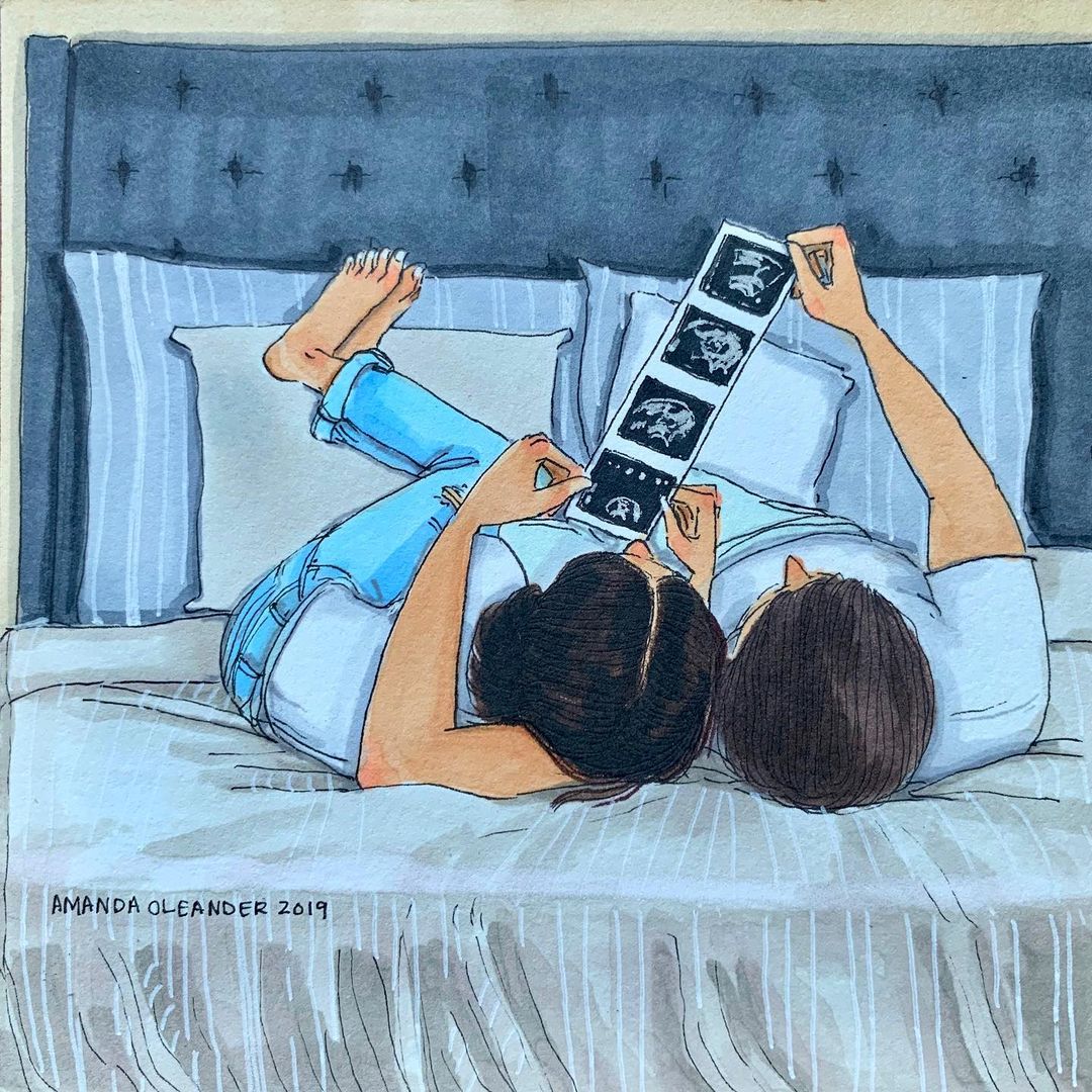 artwork of a couple looking at baby photographs in bed