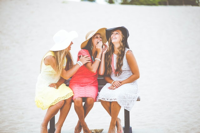 women talking and laughing