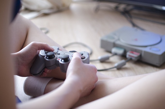 man playing video game