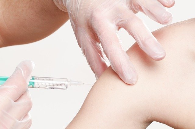 person being vaccinated