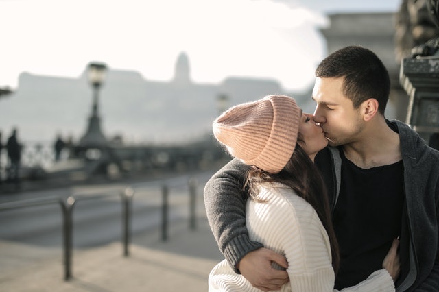 couple hugging and kissing