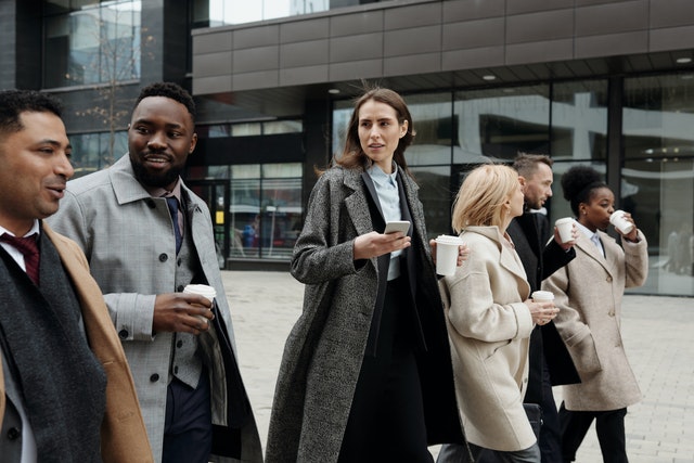 co-worker friends taking coffee break