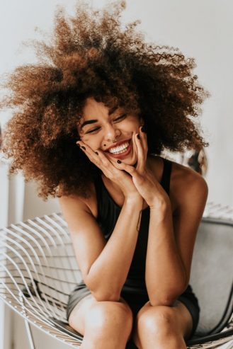 curly woman smiling