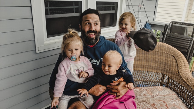 happy man with children on terrace