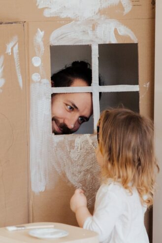 man staring at his child
