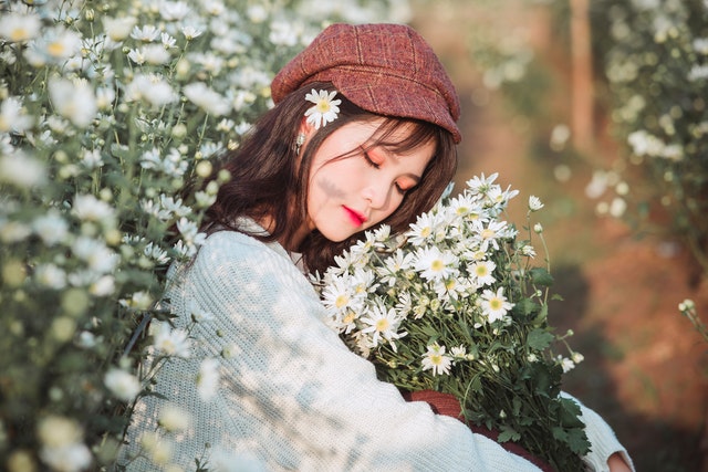 woman carrying a bouquet